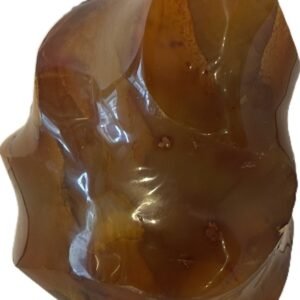 Hand carved polished carnelian flame sculpture featuring twisting ridges with deep mahogany red burnt orange tones and smoky chalcedony patches isolated on a white background